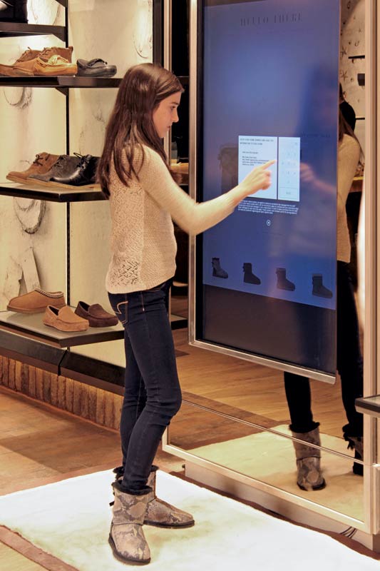 Touchscreen shopping in an Ugg flagship.