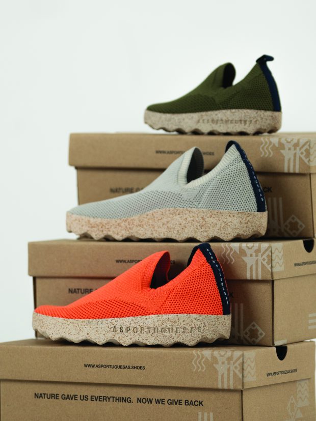 Clip slip-ons feature elastic recycled knit uppers and cork/latex outsoles.